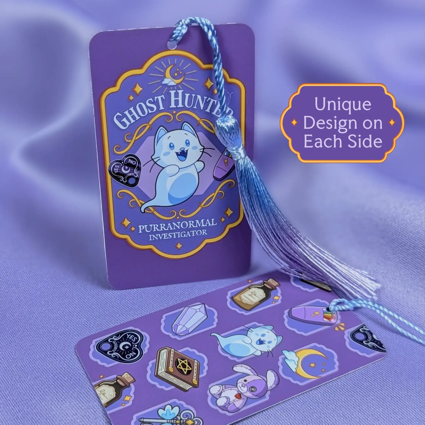 Text that says "1 bookmark, 2 unique sides" with an image of both sides of the purple ghost hunter bookmark