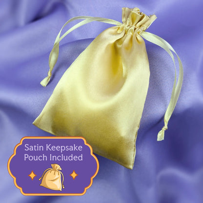 Gold satin keepsake pouch with text overlay that says it is included free