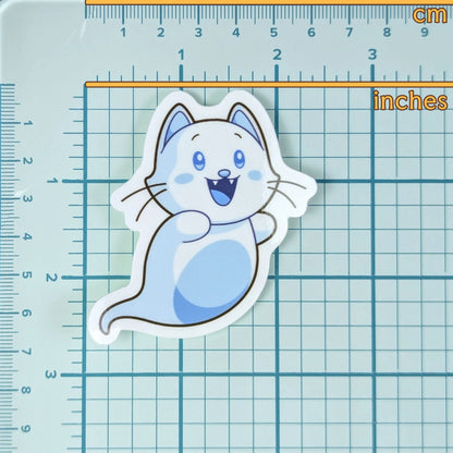 Cute ghost cat sticker on a grid background with measurements to show scale.